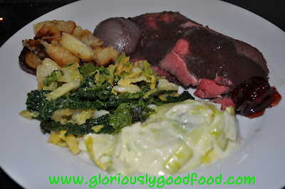 roast venison | venison with red wine | italian roast potatoes | cabbage with olive oil and garlic | creamy leeks in white sauce