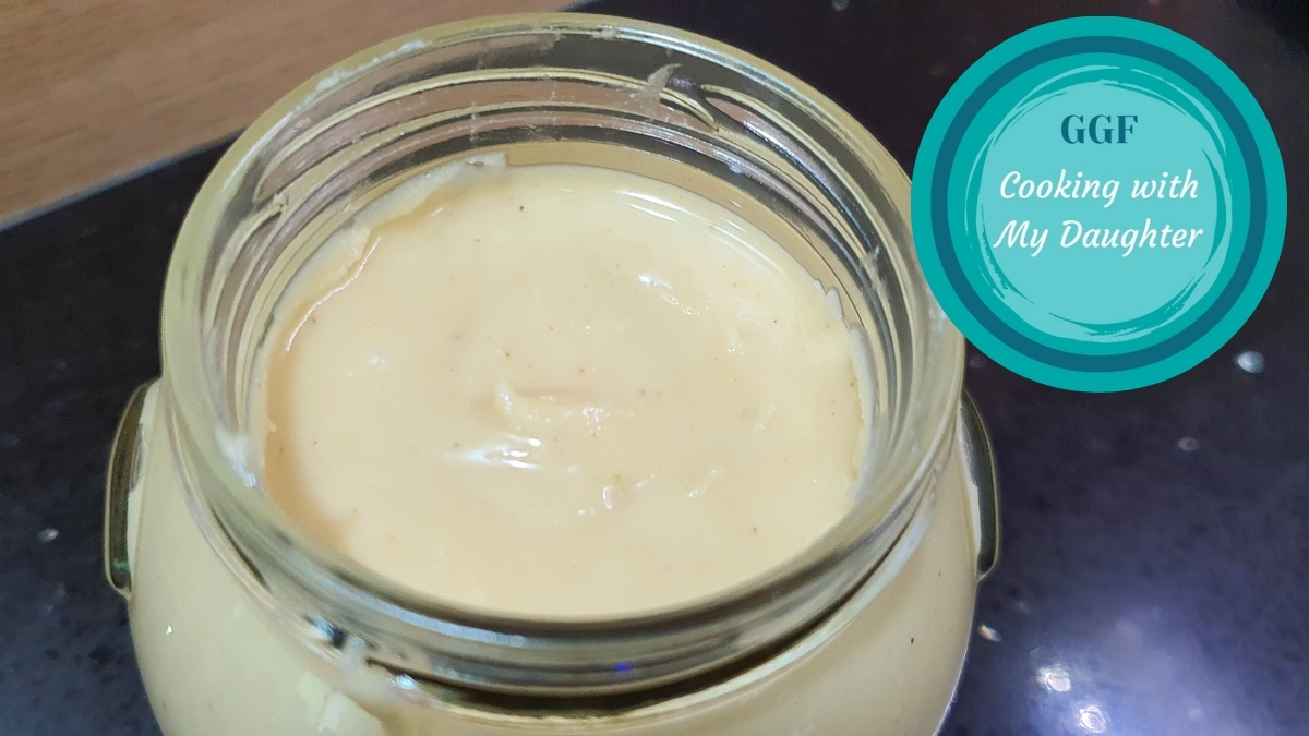 Sweet Cashew Butter in a glass jar, pictured from the top